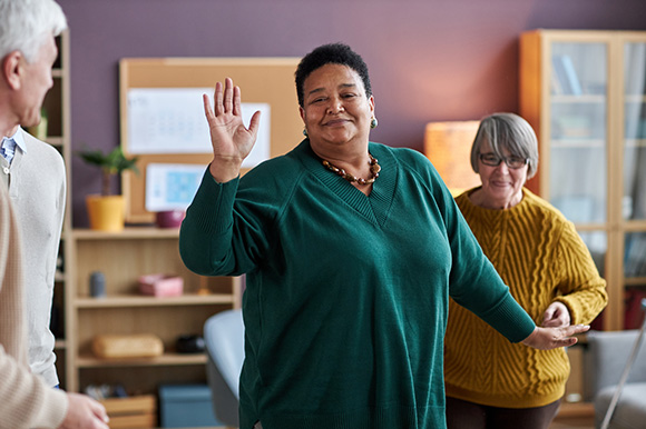 happy group of diverse seniors interacting in a cozy indoor setting celebrating life and connection with warmth and joy 5 activities 5 friends 5 smiles