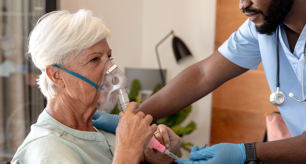 senior woman receiving oxygen assistance from healthcare professional with medical equipment for breathing support and comfort during treatment session 8 essential health tips