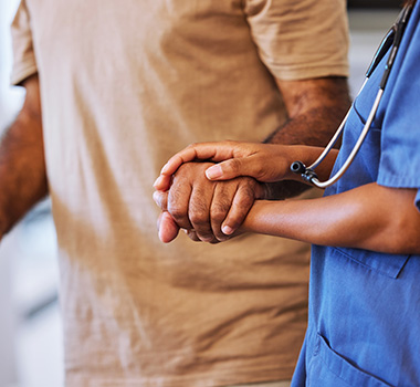 hands of a patient and nurse in a caring moment conveying support and trust in a medical setting 3 healthcare approaches